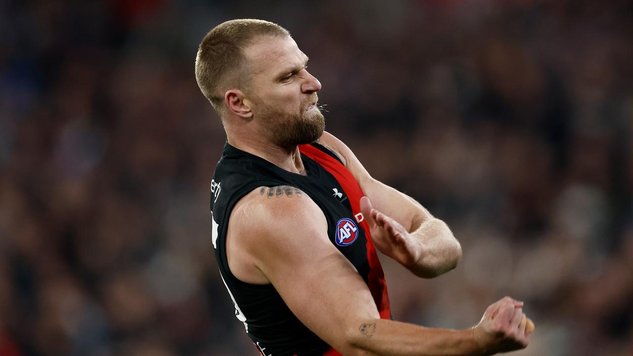 MELBOURNE, AUSTRALIA - JULY 05: Jake Stringer of the Bombers celebrates a goal during the 2024 AFL Round 17 match between the Collingwood Magpies and the Essendon Bombers at Melbourne Cricket Ground on July 05, 2024 in Melbourne, Australia. (Photo by Michael Willson/AFL Photos via Getty Images)