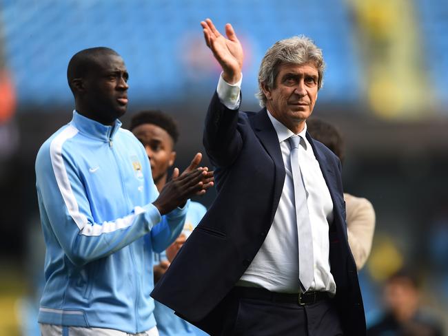 Outgoing Manchester City manager Manuel Pellegrini farewells the home fans.