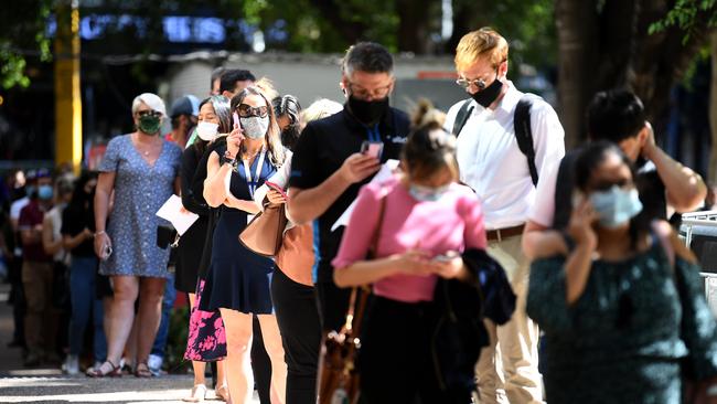 Queenslanders are being advised to wear masks indoors through August to September. Picture: NCA NewsWire / Dan Peled