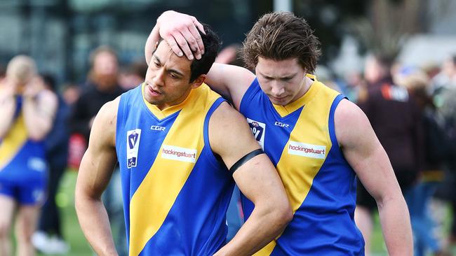 MELBOURNE, AUSTRALIA - SEPTEMBER 16:  Jaylon Thorpe of Williamstown (L)  who missed a goal in the dying seconds, looks dejected alongside Billy Myers after defeat during the VFL Preliminary Final match between Williamstown and Box Hill at North Port Oval on September 16, 2018 in Melbourne, Australia.  (Photo by Michael Dodge/AFL Media/Getty Images)