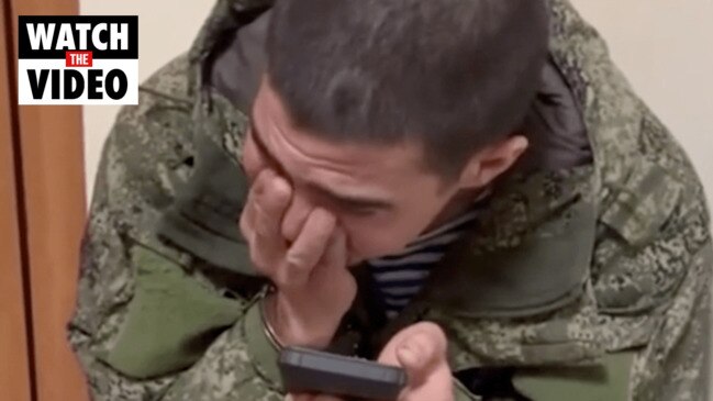 Handcuffed Russian prisoner of war weeps on the phone to his family