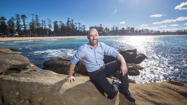 Airbnb spokesman Brent Thomas at Manly Beach. Picture: Julian Andrews.