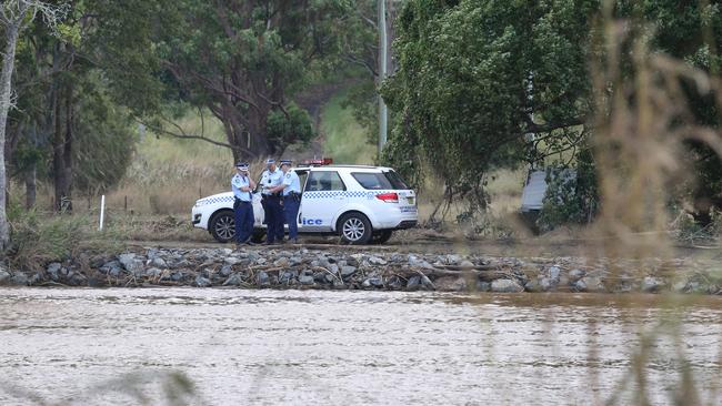 Three feared dead after car plunges into Tweed river at Tumbulgum Northern NSW. Police at the scene. Picture Glenn Hampson