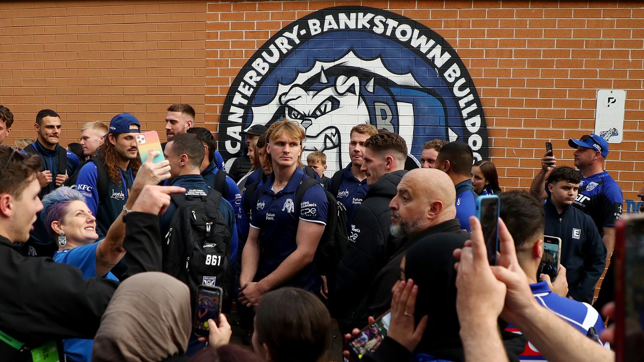 Bulldogs players were mobbed by passionate fans on their way to the ground. Picture: Jeremy Ng/Getty Images