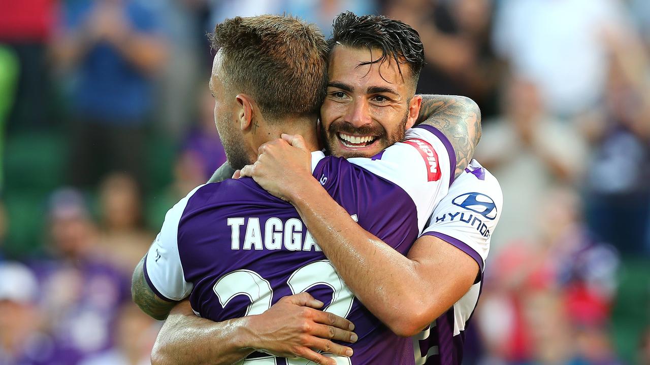 Adam Taggart with Xavier Torres during the round three A-League match between Perth Glory and the Central Coast Mariners.