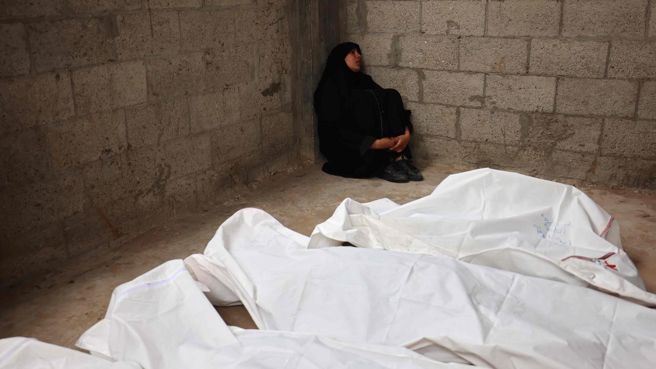 A Palestinian woman mourns her relatives, who were killed in an Israeli bombardment, at the al-Najjar hospital in Rafah. Picture: AFP