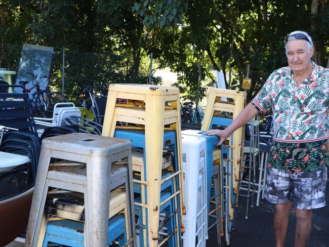 Retired builder Terry Downes inspects items at Tweed JUNKtion for restoration and resale.