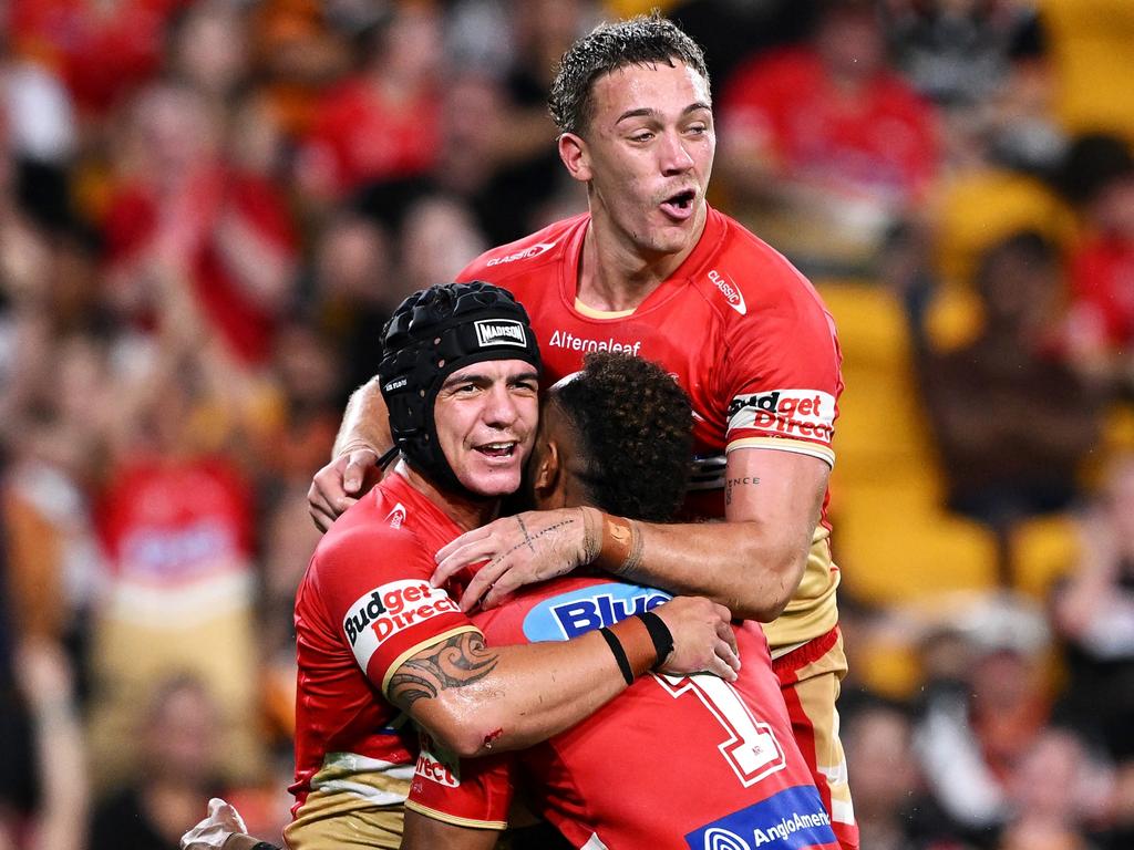 Kodi Nikorima celebrates a try with his Dolphins teammates. Picture: Bradley Kanaris/Getty Images