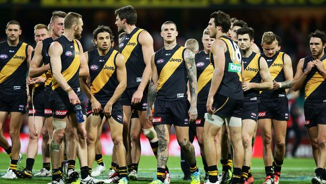 Dejected Tigers players leave the field after being thrashed by Sydney last year. Photo: Matt King/Getty Images