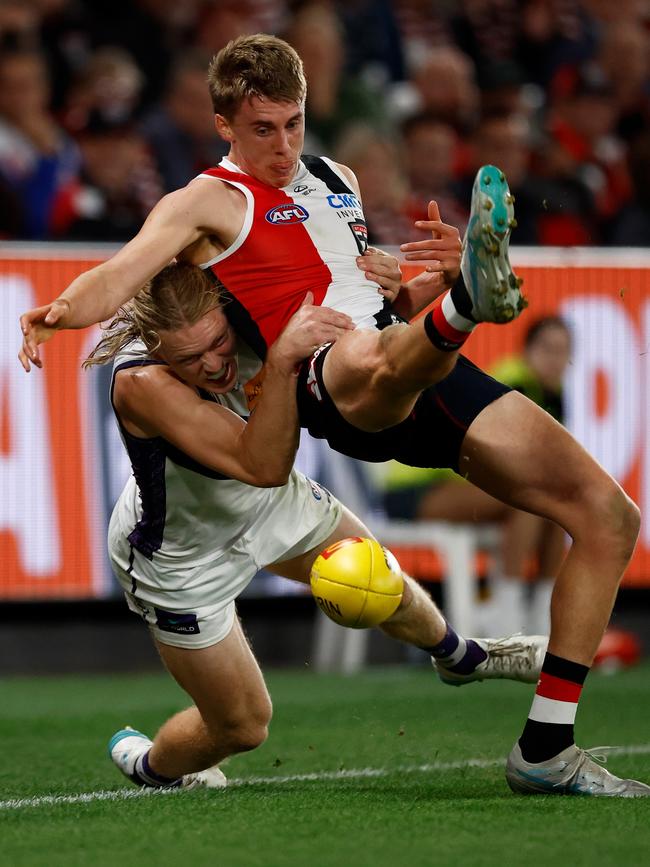 Hayden Young is injured while tackling Liam O’Connell.