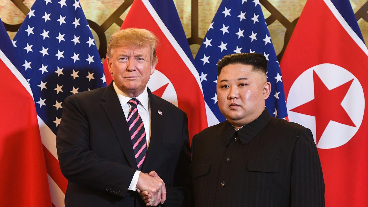 Donald Trump shakes hands with North Korea’s leader Kim Jong-un before a meeting at the Sofitel Legend Metropole hotel in Hanoi. Picture: Saul Loeb / AFP