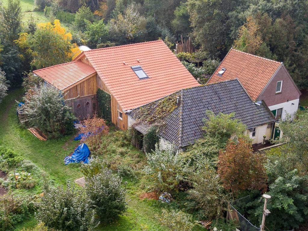 The family had been surviving on vegetables and animals tended in a secluded garden. Picture: Wilbert Bijzitter/EPA/AAP