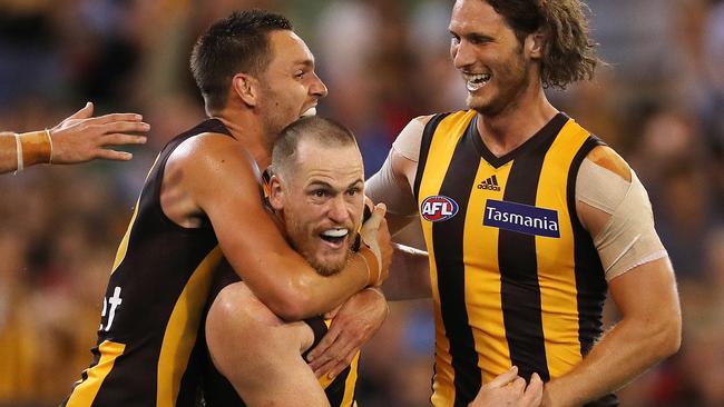 Jarryd Roughead is mobbed after kicking his first goal in his comeback game. Picture: Michael Klein