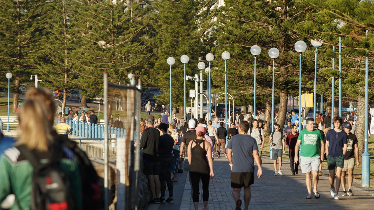 The 1.5m social distancing rule appears difficult to follow in such large crowds. Photo: Tim Pascoe