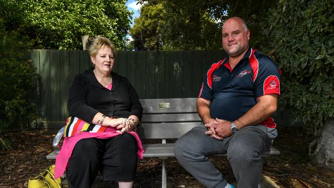 Phillipa Maloney-Walsh and Tony Cross on the seat at Kings Park Upper Ferntree Gully where Kevin Walsh loved to watch the cricket. Picture: Penny Stephens