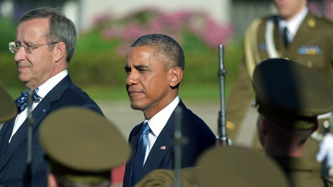 Estonia's President Toomas Hendrik Ilves and US President Barack Obama inspect a military honour guard prior to meetings in Tallinn, Estonia, yesterday.