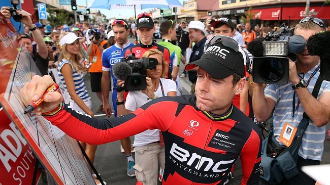 Cadel Evans, in BMC Racing Team gear, signs on before Stage Two of the Tour Down Under.