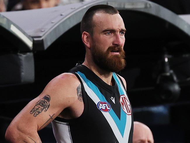 ADELAIDE, AUSTRALIA - APRIL 13: Charlie Dixon of the Power on the sideline during the 2024 AFL Round 05 match between the Port Adelaide Power and the Fremantle Dockers at Adelaide Oval on April 13, 2024 in Adelaide, Australia. (Photo by James Elsby/AFL Photos via Getty Images)