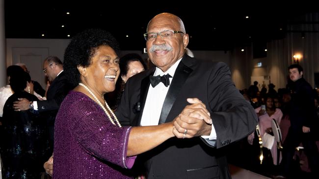 One-time Fijian coup leader Sitiveni ‘Rambo’ Rabuka dances with his wife Sulueti at a fundraiser in Sydney. Picture: Monique Harmer