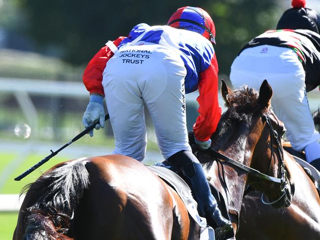 MELBOURNE, AUSTRALIA - JANUARY 09: General view of jockey holding the whip during Melbourne Racing at Flemington Racecourse on January 09, 2021 in Melbourne, Australia. (Photo by Vince Caligiuri/Getty Images)