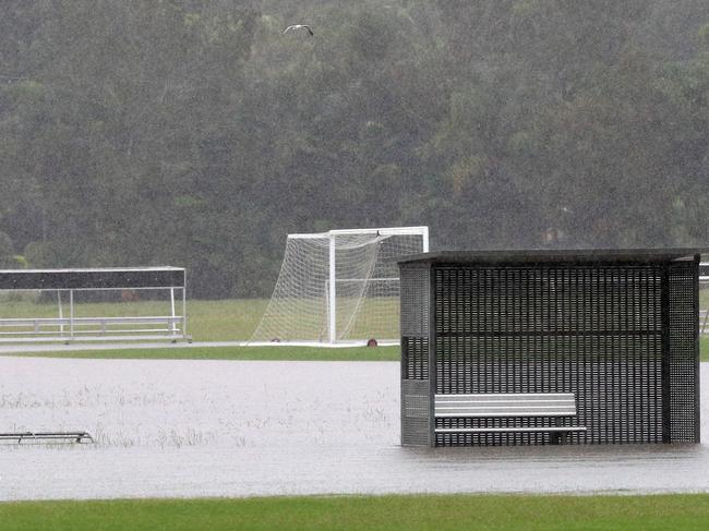 GOLD COAST, AUSTRALIA - NewsWire Photos March 23, 2021:  Tallebudgera Soccer clubs fields on Tallebudgera Connection Road, Tallebudgera are swamped by flood water , after torrential rain over night caused the creek to break its banks.NCA NewsWire / Scott Powick