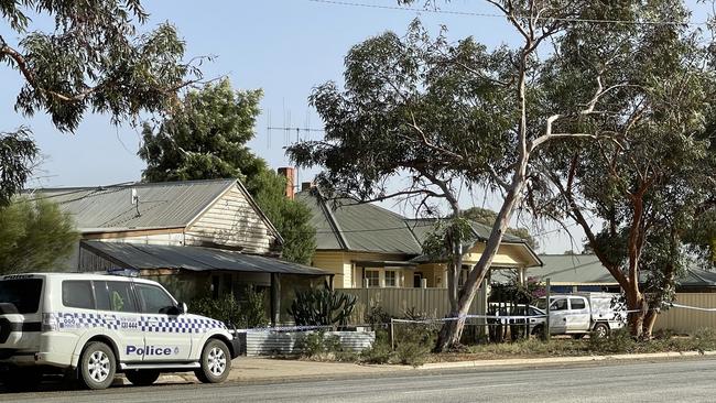 Homicide detectives at the Manangatang house where Dave Gaskell was killed. Picture: Brittany Carlson.