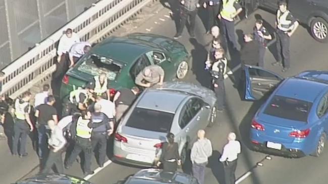 Police arrest a man on West Gate Bridge following a dramatic chase. Picture: Channel 7