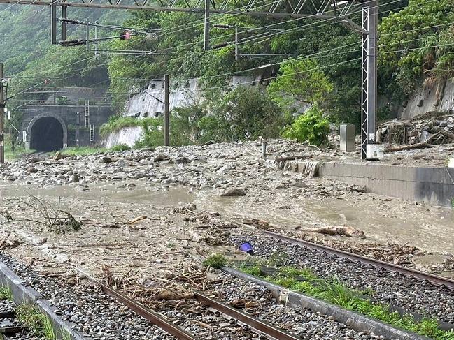 Railway tracks obscured by debris after a landslide caused by heavy rain in Hualien overnight. Picture: Picture: Taiwan’s Central News Agency