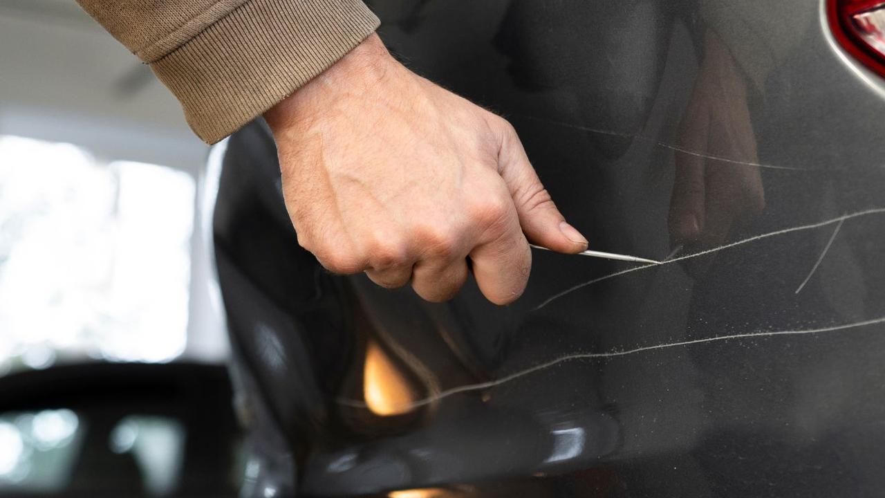 Brisbane man sues cops for $1bn over car scratch