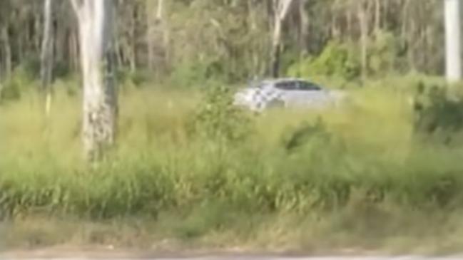 A witness at a nearby roadhouse filmed a patrol car responding to the shooting drama south of Gladstone. Photo: 9 News.