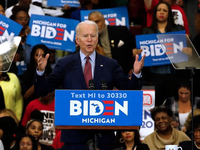 Democratic presidential candidate former Vice President Joe Biden gestures as he speaks during a campaign rally at Renaissance High School in Detroit, Michigan.