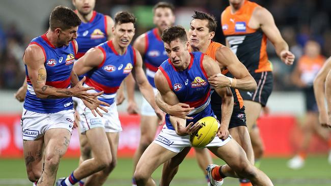 Josh Dunkley dislocated his shoulder against the Giants on Friday night. Picture: Cameron Spencer/Getty Images