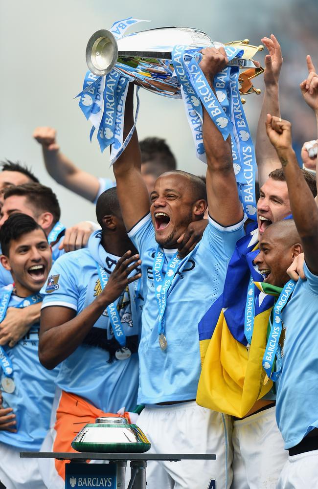 Vincent Kompany lifts the coveted EPL crown.