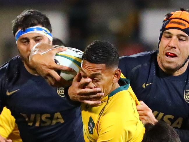 CANBERRA, AUSTRALIA - SEPTEMBER 16:  Israel Folau of the Wallabies is tackled  during The Rugby Championship match between the Australian Wallabies and the Argentina Pumas at Canberra Stadium on September 16, 2017 in Canberra, Australia.  (Photo by Scott Barbour/Getty Images)