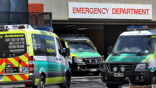 ADELAIDE, AUSTRALIA - NewsWire Photos, DECEMBER, 23 2021:  QEH ambulance bay in Adelaide, relatively quiet on Thursday afternoon, after two Covid-19 patients were forced to be transported to an Adelaide hospital in the same ambulance overnight, while another positive patient waited hours for help, according to the ambulance union. Picture: NCA NewsWire / Dean Martin