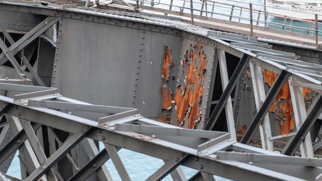 A painting blitz will be launched on the Harbour Bridge to spruce up the Sydney icon in time for its 100th birthday., With parts of the coathanger becoming increasingly rusty, 12 more painters will be brought on full-time to paint a third of the bridge by 2038., Some parts of the bridge have not been painted in 30 years., Extra painters, earning $73,000 per year, will be brought on to ensure the arch is looking its best in time for the 100th anniversary of its opening., The new recruits will boost the dedicated Sydney Harbour Bridge team to more than 130 painters, riggers, electricians, fitters and engineers.