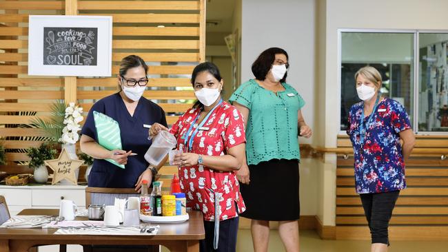 The Federal government has introduced a star rating system for aged care facilities, with a five-star rating being excellent and a one-star rating meaning “significant improvement needed”. Pyramid Residential Care Centre registered nurses Rani Thankachan and Elvira Reyes, facility manager Jennie Cotterill and administration staff Charmain Kimpjut take pride in the work they do at the Gordonvale aged care home. Picture: Brendan Radke