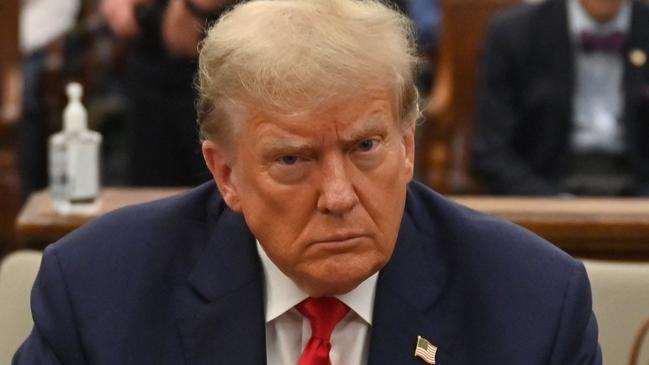 Former US President Donald Trump in court during his civil fraud trial in New York on October 4, 2023. (Photo by ANGELA WEISS / AFP)