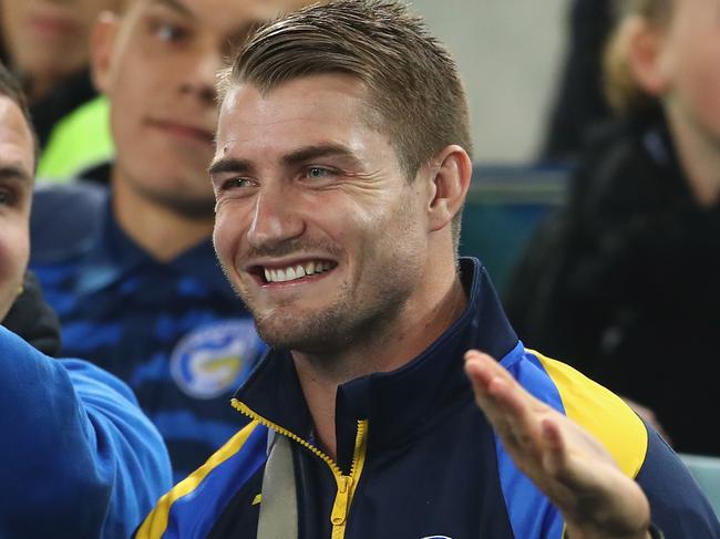 SYDNEY, AUSTRALIA - JUNE 17: Anthony Watmough and Kieran Foran share a laugh as they watch on from the stands during the round 15 NRL match between the South Sydney Rabbitohs and the Parramatta Eels at ANZ Stadium on June 17, 2016 in Sydney, Australia. (Photo by Mark Kolbe/Getty Images)