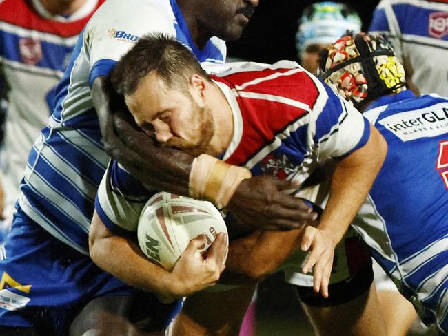 Ivanhoe's Kelly Valmadre cops one on the chin in the FNQRL preliminary final match between the Cairns Brothers and Ivanhoe Knights, held at Barlow Park. Picture: Brendan Radke