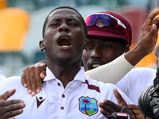 BRISBANE, AUSTRALIA - JANUARY 28: Shamar Joseph of the West Indies celebrates victory after taking the wicket of Josh Hazlewood of Australia during day four of the Second Test match in the series between Australia and West Indies at The Gabba on January 28, 2024 in Brisbane, Australia. (Photo by Bradley Kanaris/Getty Images)