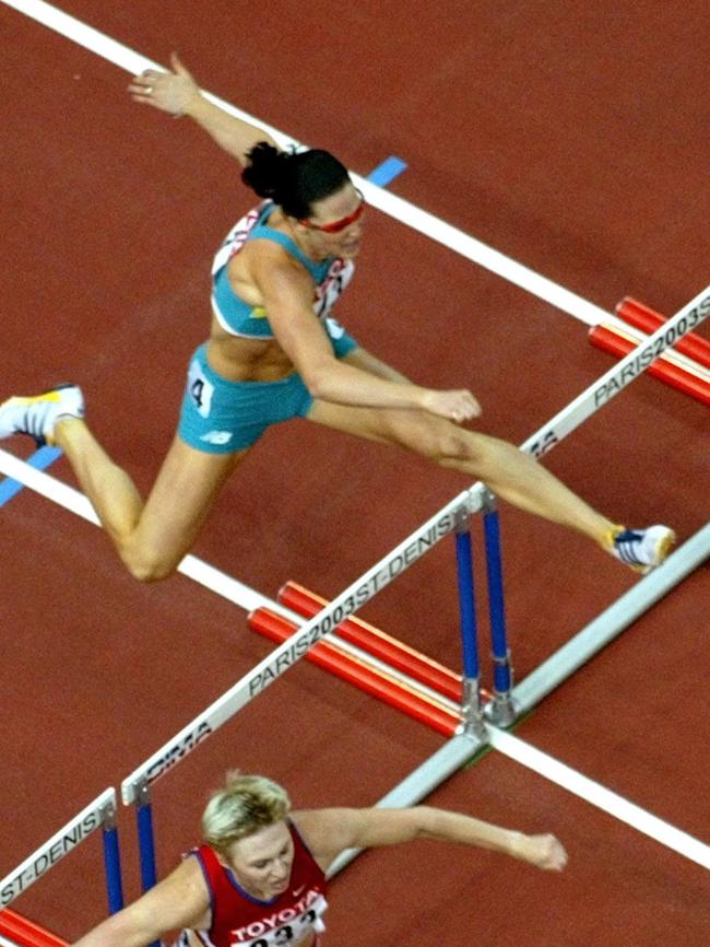 Aussie great Jana Pittman was in full flow on her way to winning the women’s 400m hurdles at the 2003 World Championships at Stade de France in Saint Denis on August 28 that year. Picture: AFP