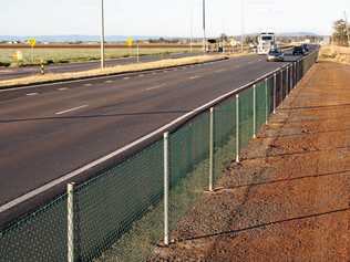 NOT HAPPY: The fence that is stopping truckies from stopping across from the McDonald’s at Gatton.