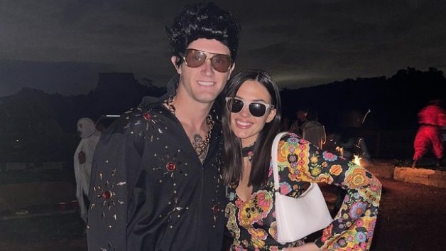 North Melbourne player Jaidyn Stephenson and girlfriend Emily Vincent dressed up as Elvis and Priscilla Presley.