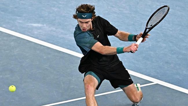 Andrey Rublev and Jannik Sinner remain in battle. (Photo by Lillian SUWANRUMPHA / AFP)