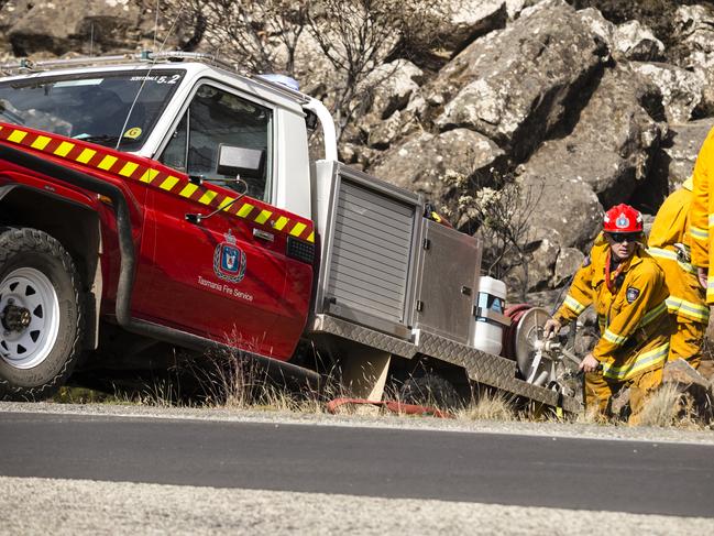 Volunteer firefighter, Matt Hartley ,of Bridport, working in the area of a controlled back burn at Miena. Picture: HEATH HOLDEN