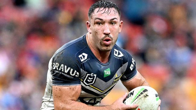 BRISBANE, AUSTRALIA - MAY 07: Reece Robson of the Cowboys runs with the ball during the round 10 NRL match between Sydney Roosters and North Queensland Cowboys at Suncorp Stadium on May 07, 2023 in Brisbane, Australia. (Photo by Bradley Kanaris/Getty Images)