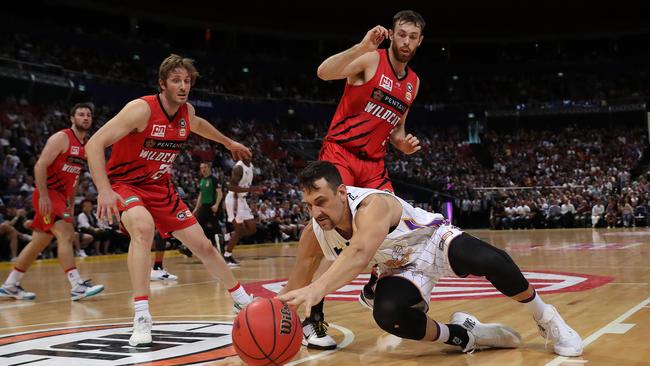 Reigning MVP Andrew Bogut isn’t afraid to get down and dirty. Picture: Brett Costello