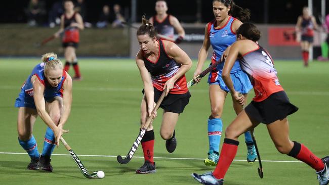 Souths’ Thea Lazarus works the ball up the field in the Cairns Hockey Association A Grade Women's Grand Final between Souths and Saints. PICTURE: BRENDAN RADKE