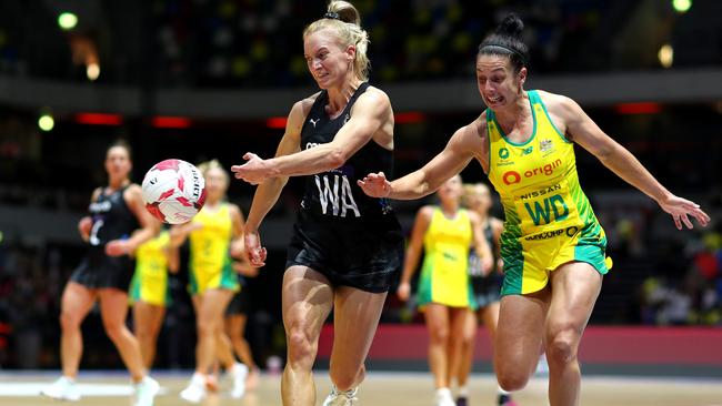 Ash Brazill of Australia battles for the ball against a New Zealand opponent during the 2022 Netball Quad Series match in England, 2022. Photo: Getty Images